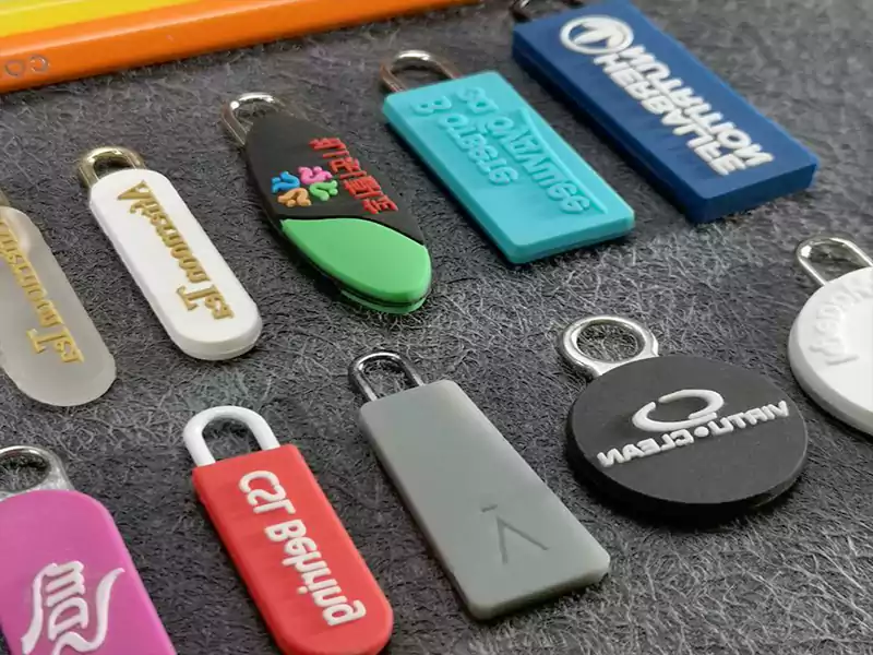 Custom Zipper pullers for clothing brands,